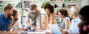 Successful group of business people at work in modern office